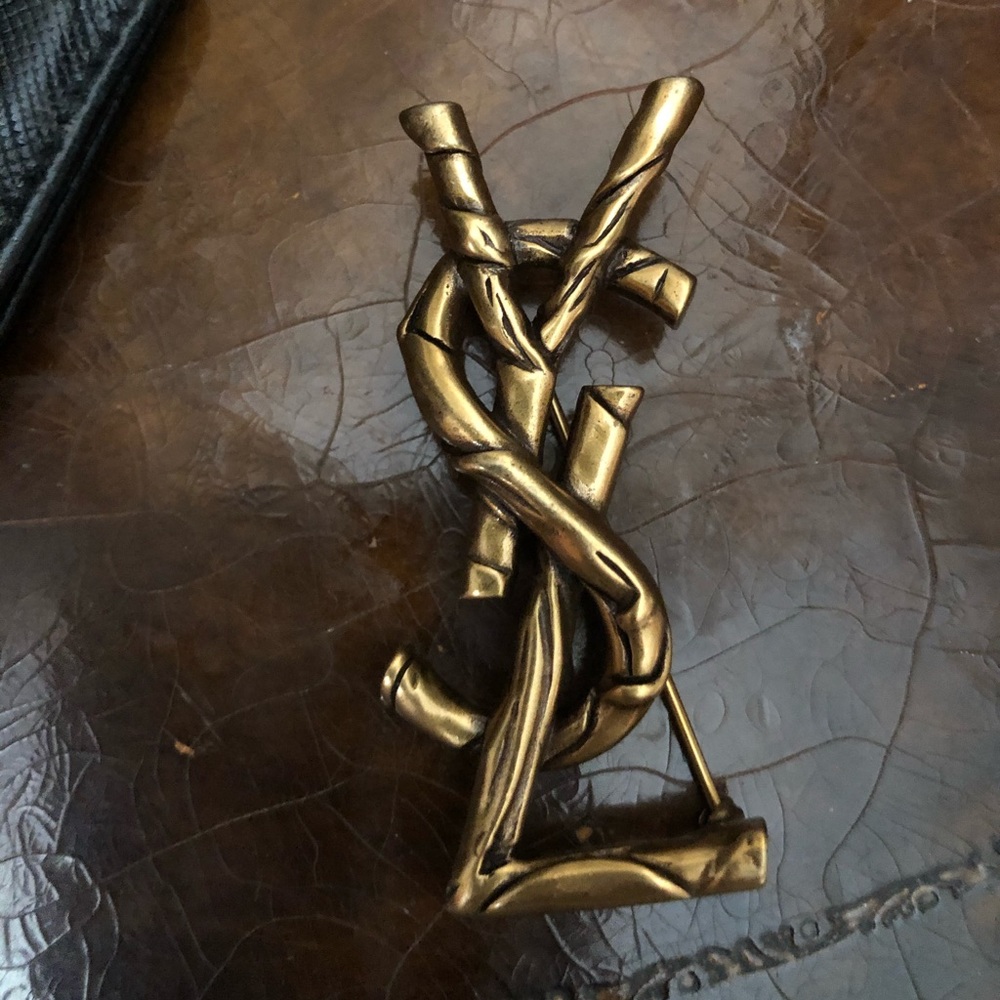 YSL brooch. Dark gold